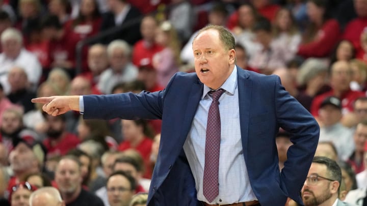 Mar 7, 2024; Madison, Wisconsin, USA; Wisconsin Badgers head coach Greg Gard reacts to a foul call during the first half against the Rutgers Scarlet Knights at the Kohl Center. Mandatory Credit: Kayla Wolf-USA TODAY Sports