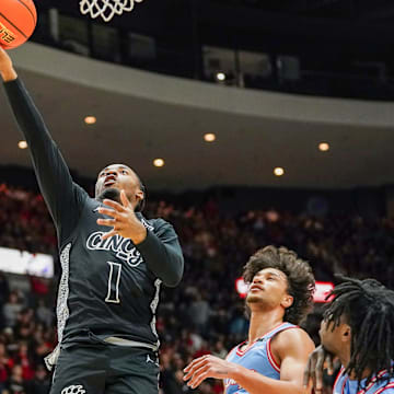Cincinnati Bearcats guard Day Day Thomas (1) hits a layup in the first half of a NCAA men’s basketball game between the Cincinnati Bearcats and Dayton Flyers, Friday, Dec. 20, 2024, at Heritage Bank Center in downtown Cincinnati.