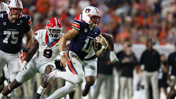 Oct 11, 2025; Auburn, Alabama, USA;  Auburn Tigers quarterback Jackson Arnold (11) carries during the second quarter against the Georgia Bulldogs at Jordan-Hare Stadium. Mandatory Credit: John Reed-Imagn Images