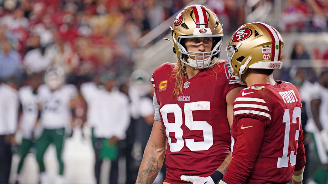 Sep 9, 2024; Santa Clara, California, USA; San Francisco 49ers tight end George Kittle (85) chats with San Francisco 49ers quarterback Brock Purdy (13) while facing the New York Jets in the fourth quarter at Levi's Stadium. Mandatory Credit: David Gonzales-Imagn Images