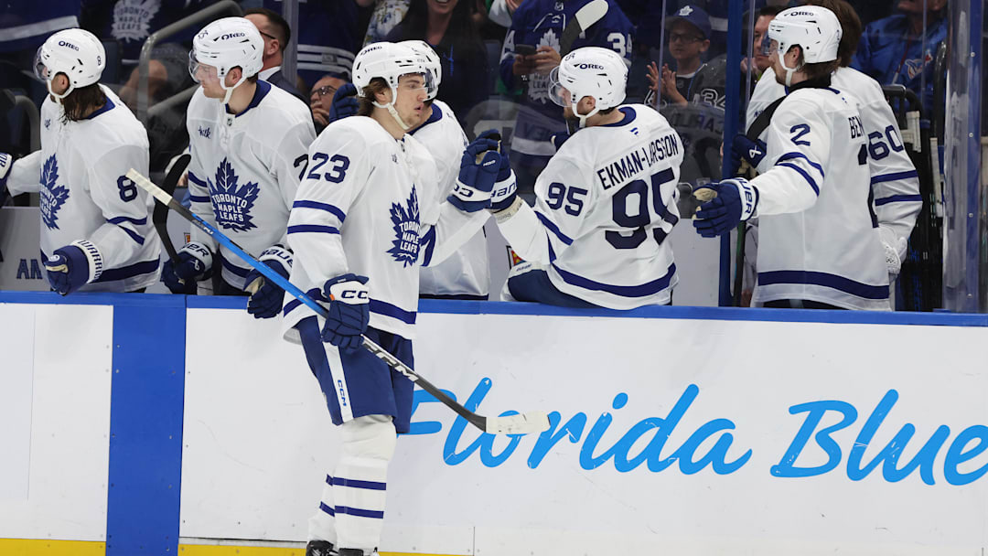 Apr 9, 2025; Tampa, Florida, USA; Toronto Maple Leafs left wing Matthew Knies (23) is congratulated after he scored a goal against the Tampa Bay Lightning during the third period at Amalie Arena. Mandatory Credit: Kim Klement Neitzel-Imagn Images