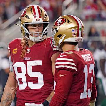 San Francisco 49ers tight end George Kittle (85) chats with San Francisco 49ers quarterback Brock Purdy.