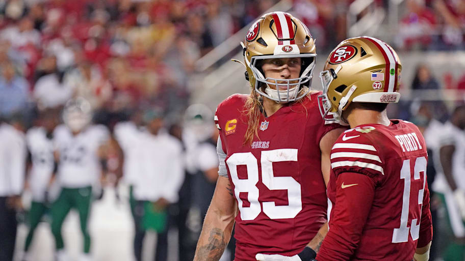 San Francisco 49ers tight end George Kittle (85) chats with San Francisco 49ers quarterback Brock Purdy. | David Gonzales-Imagn Images