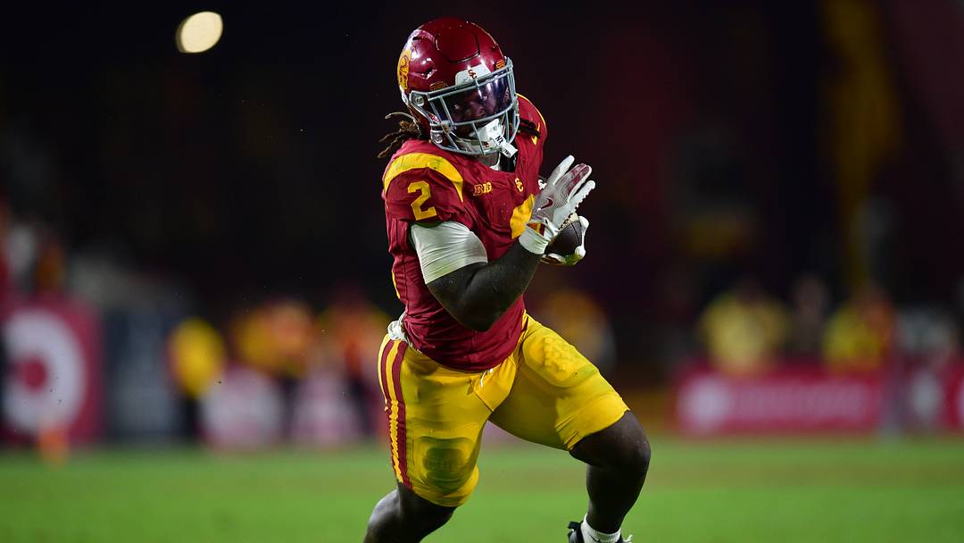 Sep 20, 2025; Los Angeles, California, USA; Southern California Trojans running back Waymond Jordan (2) runs the ball against the Michigan State Spartans during the second half at the Los Angeles Memorial Coliseum. Mandatory Credit: Gary A. Vasquez-Imagn Images