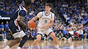 Dec 5, 2025; Nashville, TN, USA;  Kentucky Wildcats forward Trent Noah (9) drives to the basket against the Gonzaga Bulldogs during the first half at Bridgestone Arena. Mandatory Credit: Steve Roberts-Imagn Images