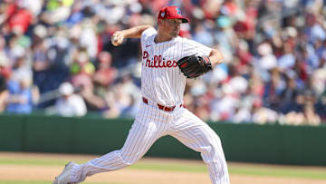 Mar 14, 2024; Clearwater, Florida, USA;  Philadelphia Phillies pitcher Andrew Bellatti (64) throws a pitch against the Boston Red Sox in the seventh inning at BayCare Ballpark. Mandatory Credit: Nathan Ray Seebeck-Imagn Images