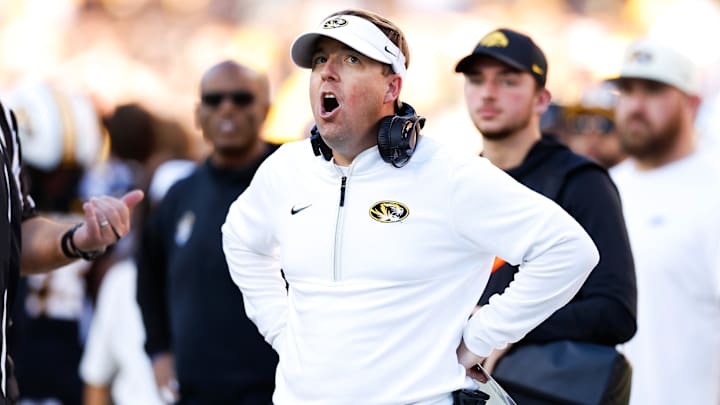 Missouri Tigers head coach Eliah Drinkwitz calls to his players from the sideline in the TransPerfect Music City Bowl versus the Iowa Hawkeyes, last season.