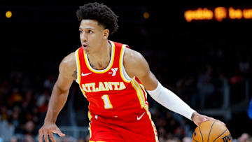 Hawks forward Jalen Johnson driving to the rim during a home game versus the Detroit Pistons.