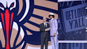 Jun 25, 2025; Brooklyn, NY, USA;  Asa Newell stands with NBA commissioner Adam Silver after being selected as the 23rd pick by the New Orleans Pelicans in the first round of the 2025 NBA Draft at Barclays Center. Mandatory Credit: Brad Penner-Imagn Images