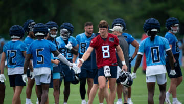 Tennessee Titans quarterback Will Levis (8) congratulates his teammates after running a set of drills on the first day of training camp at Ascension Saint Thomas Sports Park Wednesday, July 24, 2024.