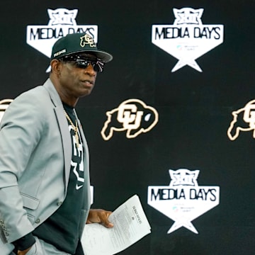 Jul 9, 2025; Frisco, TX, USA; Colorado head coach Deion Sanders walks onto the stage during 2025 Big 12 Football Media Days at The Star. Mandatory Credit: Raymond Carlin III-Imagn Images