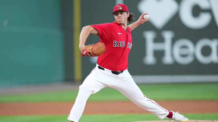 Mar 3, 2026; Lee County, FL, USA;  Boston Red Sox pitcher Jake Bennett (64) pitches in the first inning against the Puerto Rico. Mandatory Credit: Jim Rassol-Imagn Images
