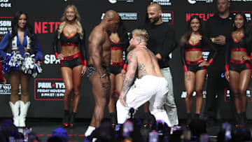 Jake Paul and Mike Tyson face off during weigh-ins at the Toyota Music Factory the day before their fight. 