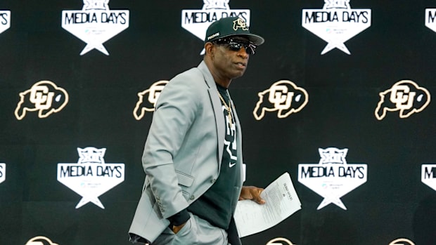 Colorado head coach Deion Sanders walks onto the stage during 2025 Big 12 Football Media Days at The Star. 