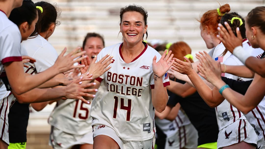 Shea Baker runs out during the starting lineup announcement at Alumni Stadium on April 16, 2026.