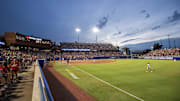 Jun 5, 2025; Oklahoma City, OK, USA;  The Texas Longhorns and the Texas Tech Red Raiders play in game two of the NCAA Softball Women's College World Series finals at Devon Park. Mandatory Credit: Brett Rojo-Imagn Images