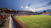 Jun 5, 2025; Oklahoma City, OK, USA;  The Texas Longhorns and the Texas Tech Red Raiders play in game two of the NCAA Softball Women's College World Series finals at Devon Park. Mandatory Credit: Brett Rojo-Imagn Images