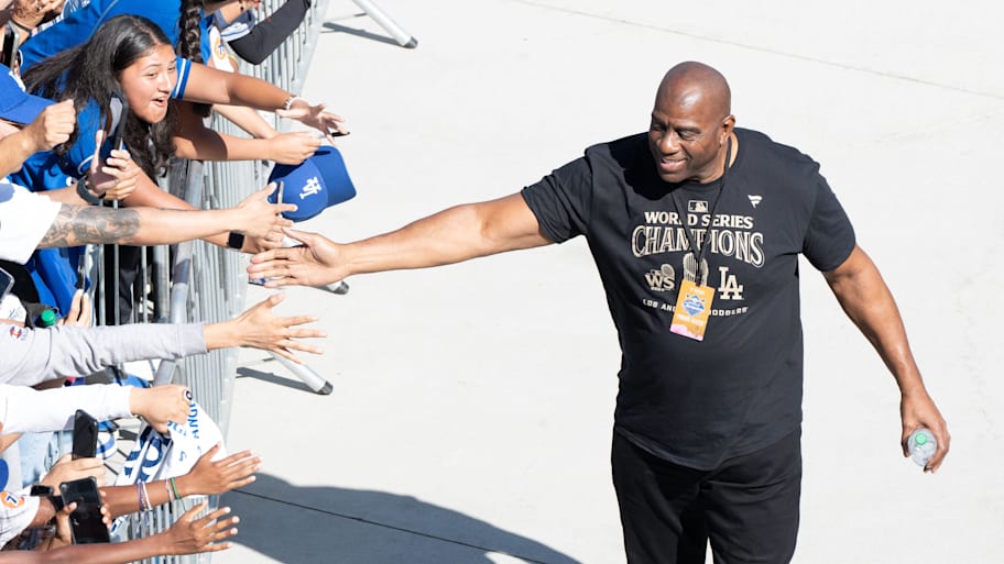 Los Angeles Dodgers minority owner and former Los Angeles Laker Magic Johnson celebrates World Series win. | Sandy Hooper / USA TODAY NETWORK via Imagn Images