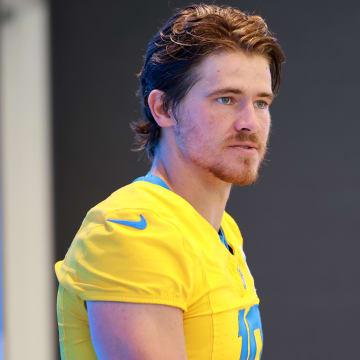 Jul 24, 2024; El Segundo, CA, USA;  Los Angeles Chargers quarterback Justin Herbert (10) speaks to the media after the first day of training camp at The Bolt. Mandatory Credit: Kiyoshi Mio-USA TODAY Sports