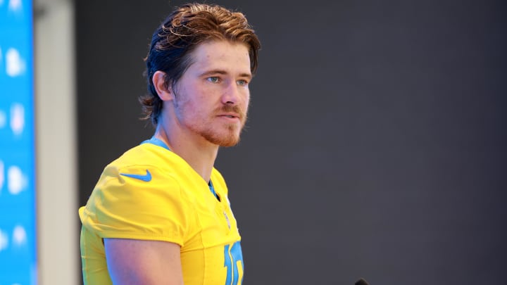 Jul 24, 2024; El Segundo, CA, USA;  Los Angeles Chargers quarterback Justin Herbert (10) speaks to the media after the first day of training camp at The Bolt. Mandatory Credit: Kiyoshi Mio-USA TODAY Sports