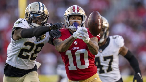 New Orleans Saints cornerback Rejzohn Wright (28) breaks up a pass to 49ers wide receiver Ronnie Bell (10) 