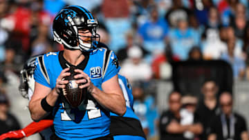 Oct 13, 2024; Charlotte, North Carolina, USA;  Carolina Panthers quarterback Andy Dalton (14) prepares to throw in the first quarter at Bank of America Stadium.