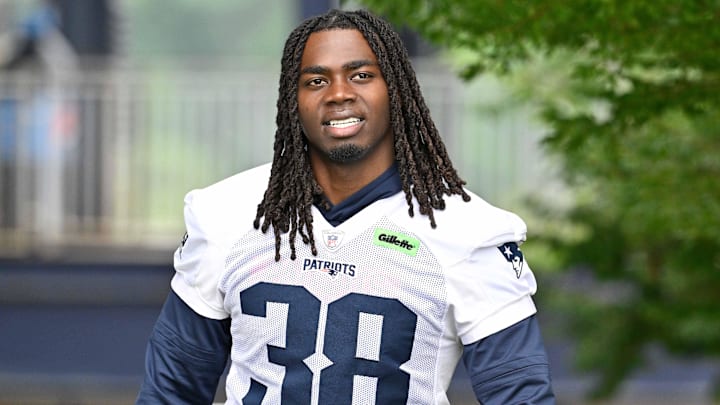 Jun 9, 2025; Foxborough, MA, USA; New England Patriots running back Rhamondre Stevenson (38) walks to the practice fields at Gillette Stadium. Mandatory Credit: Eric Canha-Imagn Images