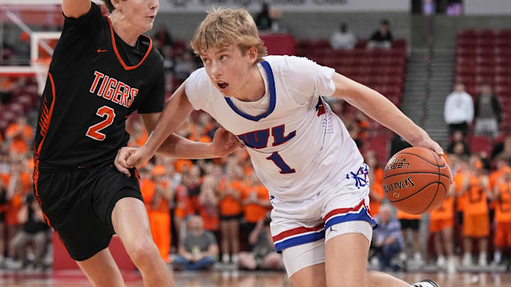 Wisconsin Lutheran's Kager Knueppel (1) breaks around Marshfield's Joey Ketterer (2) in the WIAA Division 1 boys state championship game, Saturday, March 22, 2025, at the Kohl Center in Madison, Wis. 