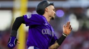 Jul 10, 2024; Cincinnati, Ohio, USA; Colorado Rockies designated hitter Brenton Doyle (9) scores on a RBI double hit by outfielder Jake Cave (not pictured) in the sixth inning against the Cincinnati Reds at Great American Ball Park.