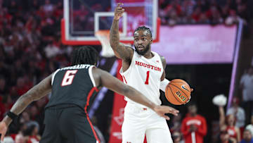 Jan 17, 2024; Houston, Texas, USA; Houston Cougars guard Jamal Shead (1) controls the ball as Texas