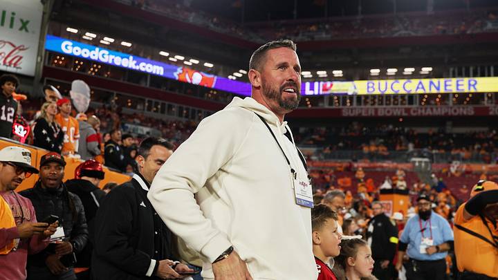 Dec 11, 2025; Tampa, Florida, USA; University of South Florida Bulls football head coach Brian Hartline stands on the field before the game between the Atlanta Falcons and the Tampa Bay Buccaneers at Raymond James Stadium. Mandatory Credit: Nathan Ray Seebeck-Imagn Images