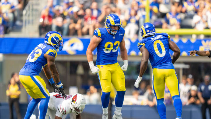 October 15, 2023; Inglewood, California, USA; Los Angeles Rams defensive end Jonah Williams (92) is congratulated by linebacker Ernest Jones IV (53) and linebacker Byron Young (0) for sacking Arizona Cardinals quarterback Joshua Dobbs (9) during the first quarter at SoFi Stadium. Mandatory Credit: Kyle Terada-USA TODAY Sports