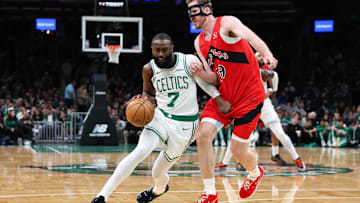 Oct 15, 2025; Boston, Massachusetts, USA; Boston Celtics forward Jaylen Brown (7) drives to the basket during the first half against the Toronto Raptors at TD Garden. Mandatory Credit: Paul Rutherford-Imagn Images