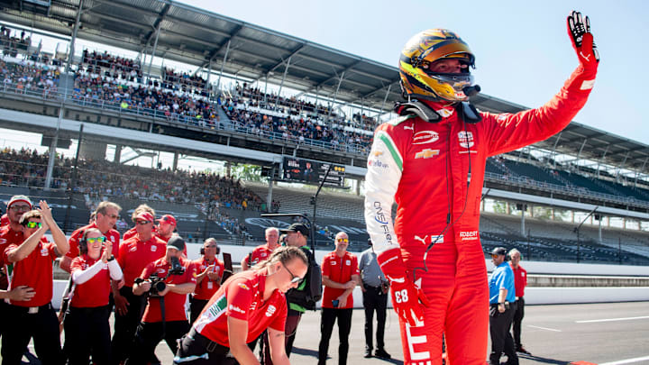 PREMA Racing driver Robert Shwartzman waves to the crowd after completing his run Sunday, May 18, 2025, during Top 12 qualifying for the 109th running of the Indianapolis 500 at Indianapolis Motor Speedway. PREMA Racing driver Robert Shwartzman waves to the crowd after completing his run Sunday, May 18, 2025, during Top 12 qualifying for the 109th running of the Indianapolis 500 at Indianapolis Motor Speedway.