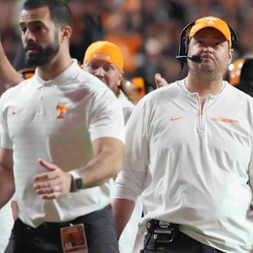 Nov 2, 2024; Knoxville, Tennessee, USA; Tennessee Volunteers head coach Josh Heupel looks at the scoreboard after a touchdown against the Kentucky Wildcats during the first half at Neyland Stadium. Mandatory Credit: Caitie McMekin/USA TODAY Network via Imagn Image
