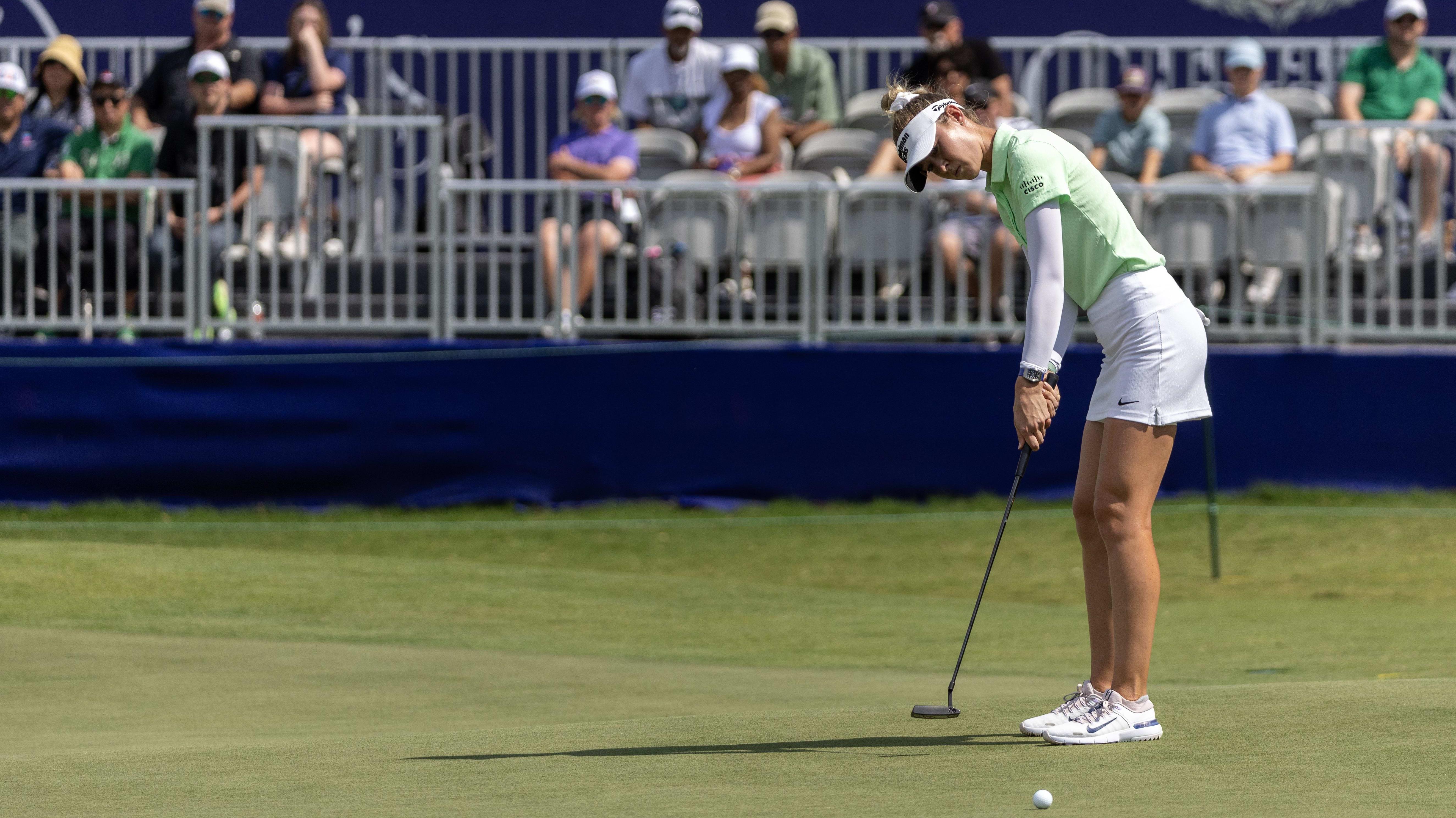 Nelly Korda putts on the 18th green during the first round of the 2024 Chevron Championship.