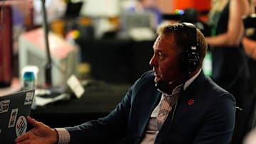 July 15, 2025; Atlanta, GA, USA; Auburn head coach Hugh Freeze talks to a radio personality during SEC Media Days at the College Football Hall of Fame in Atlanta.