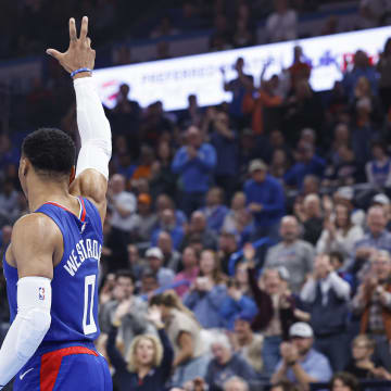 Feb 22, 2024; Oklahoma City, Oklahoma, USA; LA Clippers guard Russell Westbrook (0) waves to fans as he enters the game against the Oklahoma City Thunder during the first quarter at Paycom Center. Mandatory Credit: Alonzo Adams-USA TODAY Sports