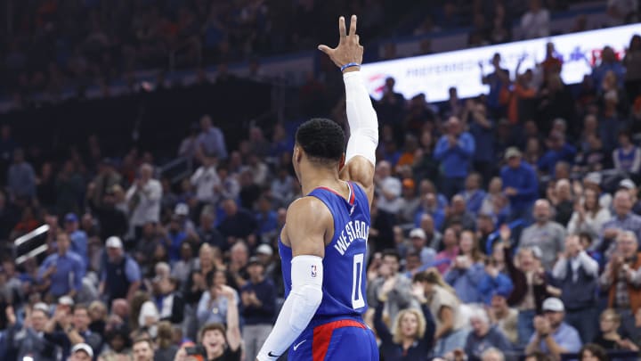 Feb 22, 2024; Oklahoma City, Oklahoma, USA; LA Clippers guard Russell Westbrook (0) waves to fans as he enters the game against the Oklahoma City Thunder during the first quarter at Paycom Center. 