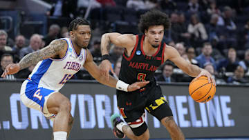 Mar 27, 2025; San Francisco, CA, USA; Maryland Terrapins guard Ja'Kobi Gillespie (0) drives to the hoop past Florida Gators guard Alijah Martin (15) during the first half during a West Regional semifinal of the 2025 NCAA tournament at Chase Center. Mandatory Credit: Kyle Terada-Imagn Images