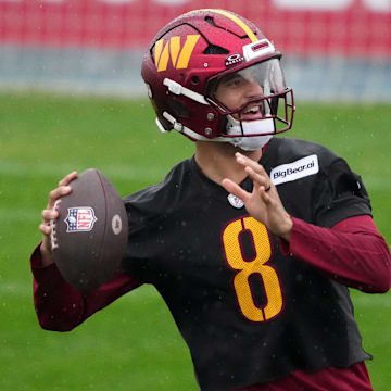 Nov 13, 2025; Madrid, Spain; Washington Commanders quarterback Marcus Mariota (8) throws the ball during practice at Ciudad Deportiva del Real Madrid. Mandatory Credit: Kirby Lee-Imagn Images