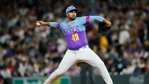 Colorado Rockies pitcher Antonio Senzatela throws a pitch wearing powder blue city connect jersey and hat.