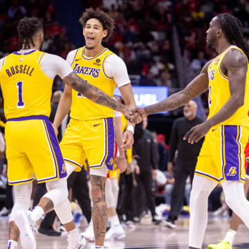 Apr 16, 2024; New Orleans, Louisiana, USA; Los Angeles Lakers center Jaxson Hayes (11) reacts to a play with guard D'Angelo Russell (1) on a time out against the New Orleans Pelicans during the first half of a play-in game of the 2024 NBA playoffs against the New Orleans Pelicans at Smoothie King Center. Mandatory Credit: Stephen Lew-USA TODAY Sports