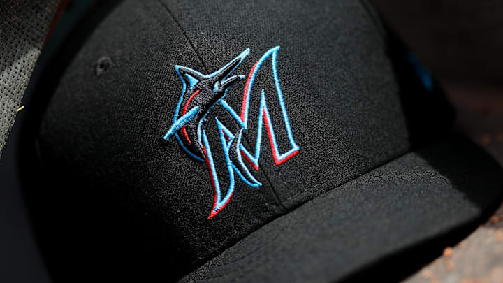 Apr 11, 2019; Cincinnati, OH, USA; A view of a New Era Miami Marlins hat in the dugout during the game against the Cincinnati Reds at Great American Ball Park. Mandatory Credit: Aaron Doster-Imagn Images
