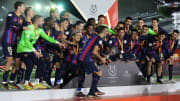 Barcelona celebrate their Supercopa de Espana success over Real Madrid
