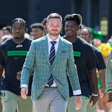 Aug 31, 2024; Eugene, Oregon, USA; Oregon Ducks head coach Dan Lanning leads the team into the stadium before the game against the Idaho Vandals at Autzen Stadium. Mandatory Credit: Craig Strobeck-Imagn Images