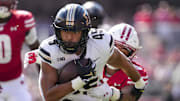Purdue Boilermakers running back Devin Mockobee (45) rushes with the football 