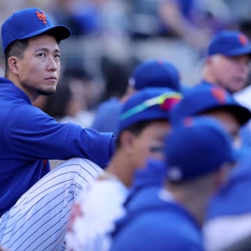 Oct 1, 2023; New York City, New York, USA; New York Mets starting pitcher Kodai Senga (34) watches from the dugout during the ninth inning against the Philadelphia Phillies at Citi Field. Mandatory Credit: Brad Penner-USA TODAY Sports