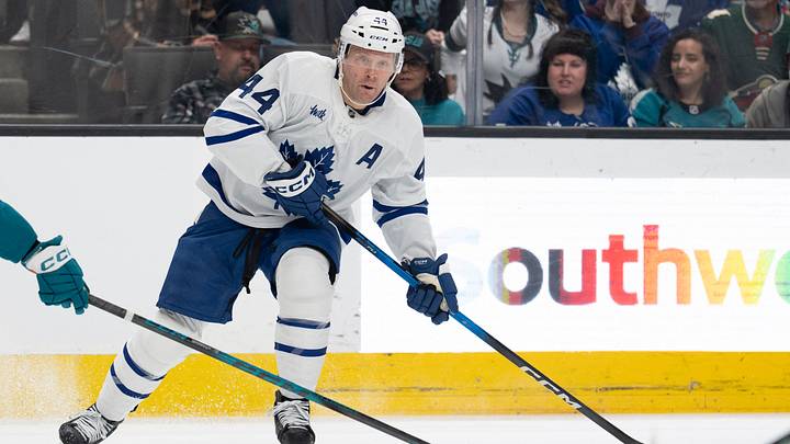 Apr 2, 2026; San Jose, California, USA;  Toronto Maple Leafs defenseman Morgan Rielly (44) looks to pass the puck during the first period against the San Jose Sharks at SAP Center at San Jose. Mandatory Credit: Stan Szeto-Imagn Images
