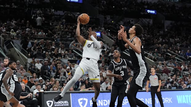 November 9, 2024; San Antonio, Texas, United States; Utah Jazz guard Isaiah Collier (13) looks to get past San Antonio Spurs guard 
